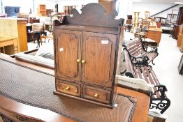 A reproduction hardwood bathroom or similar cabinet, dimensions approx. 60 x 44cm
