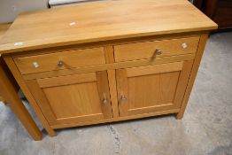 A modern golden oak sideboard, dimensions approx. W100 D43 H74cm