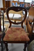 A Victorian mahogany balloon back dining chair