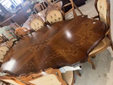 A vintage Italian style dining table and set of six (five plus one) upholstered dining chairs