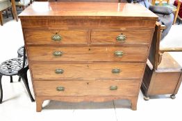 A 19th Century mahogany chest of two over three drawers having line inlay decoration, Regency