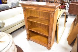 A modern stained pine bookshelf in the classical style, dimensions approx. H121 W92 D34cm