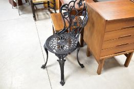 A cast aluminium garden chair
