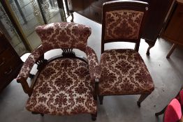 A Victorian mahogany tub chair and similarly upholstered dining chair