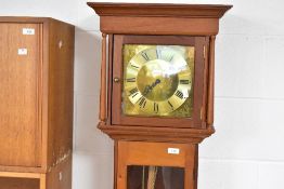 A modern long case clock, brass dial named for Paul Eden, Llanbedr