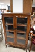 An early 20th century mahogany display cabinet, dimensions approx. Height 137 Width 83 Depth 36cm