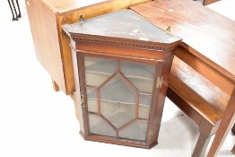 A traditional mahogany corner wall display having astral glazed door, height approx. 77cm