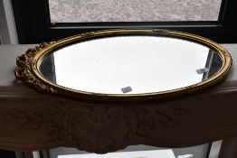 A vintage gilt frame wall mirror, approx. 63 x 37cm