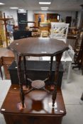 A late 19th or early 20th Century stained frame occasional table having shaped top and circular