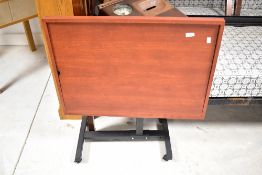 A modern portable 'jigsaw' table with adjustable height and tilt, the felt surface approx. 71 x 51cm
