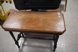 A Victorian mahogany side table having turned frame, approx. 91 x 44cm