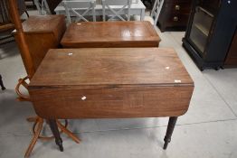 A Victorian mahogany Pembroke style dining table on turned legs, width approx.97cm