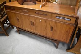 A vintage teak G plan sideboard, width approx. 150cm, some evidence of water damage to surfaces
