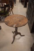 A 19th Century oak pedestal table having circular top , turned column and triple splay legs (with