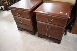 A pair of modern mahogany effect bedside drawers