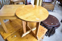 Two golden oak occasional tables including Arts & Crafts style and modern