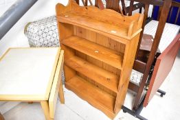 A natural pine bookshelf of convenient proportions, approx. Width 79 height 109cm