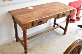 A modern hardwood side table having two frieze drawers and turned frame, dimensions approx. Width