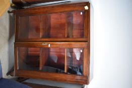 An early 20th Century mahogany china cabinet on short legs, dimensions approx. W102 D32 H130cm