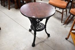 A traditional cast frame Britannia style pub table, diameter approx. 59cm
