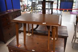 A vintage part nest of two tables