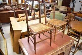 Two late 19th/early 20th Century cane seated bedroom chairs