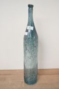 A tall vintage studio art glass, featuring a slender neck and light aqua-blue decorative body of