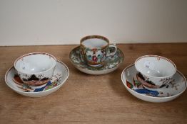 Two 19th-century Chinese porcelain tea bowl and saucer sets, featuring Chinoiserie-style