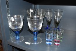 A selection of 20th-century colourful studio glasses, to feature four shot glasses, two goblet-