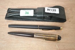 An Eversharp lever fill fountain pen in brown with ribbed cap and 14K nib, sells with a Cross