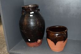 A large late 19th-century English country pottery Buckley brewing jar, having a deep brown glaze