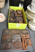 A selection of early to mid 20th-century Industrial-style wooden letter printing blocks, to
