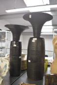 Two tall late 20th-century Patrick Reed (1943–2017) studio pottery vases, featuring amorphous,