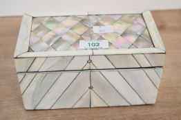 A fine Victorian mother-of-pearl and shell-inlaid box, having a blue velvet-like interior and