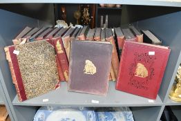 A selection of 19th to early 20th-century hardback books, with titles relating mainly to Punch and