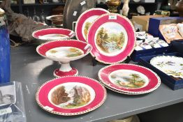 A late 19th-century part dessert service, featuring hand-painted Romantic pastoral scenes within