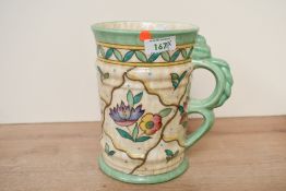A early 20th-century Charlotte Rhead for Crown Ducal ceramic 'Caliph' jug, featuring floral and