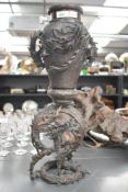 A tall late 19th to early 20th-century Japanese cast bronze dragon vase, featuring two finely