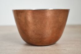 A small late 19th-century Mappin & Webb copper pudding bowl with silver plate, featuring an