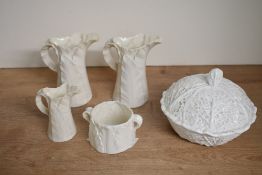 Three early 20th-century Royal Worcester porcelain leaf-moulded graduated pitchers, featuring flared