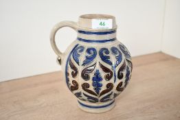 Thought to be 18th-century Westerwald stoneware salt glazed jug, of globular-form having incised and