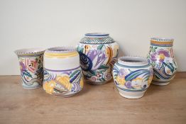 Five mid 20th-century Poole pottery floral bud vase, featuring colourful hand painted floral and