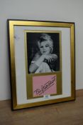 A 20th-century framed Brigitte Bardot (French, 1934-2025) autograph, mounted with a black and