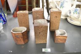 A selection of late 20th-century Patrick Reed (1943–2017) studio pottery bud vases, featuring
