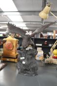 An accomplished early to mid-20th-century Ronald Van Ruyckevelt-style cast metal eagle, the figure