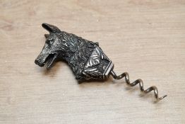 An unusual late 19th to early 20th-century white metal wolf head handled corkscrew, unmarked,