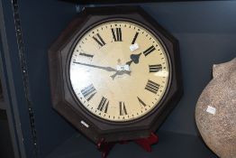 A large early 20th-century Gents of Leicester G.P.O bakelite case wall clock, of octagonal form,
