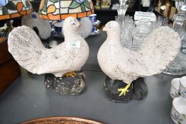 Two sweet vintage stone dove ornaments, perched upon darkly painted bases, unmarked, approximately