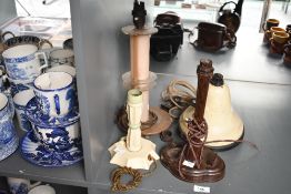 A selection of early 20th-century Art Deco bakelite table lamp bases, of differing styles, to