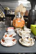 A selection of early 19th-century Rockingham Works pottery of Swinton cups and saucers, to feature a